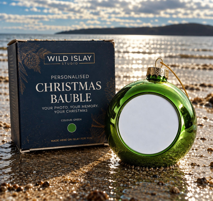 Green glass Christmas bauble, shown blank before personalising